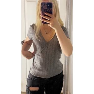 Hollister grey knitted material. Size medium in great condition!